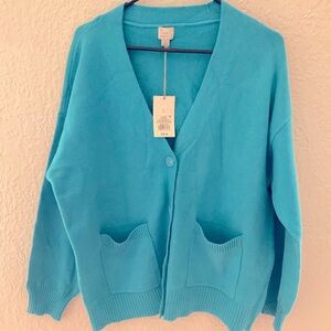 Brand new with tag women’s button sweater sz lg 
Very soft and has pockets